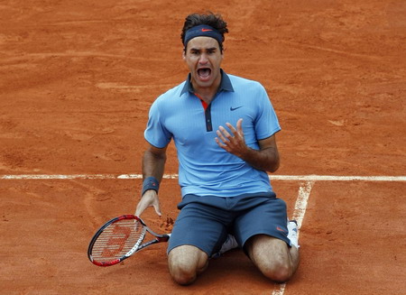 Grand Slam Federer storms to French Open glory