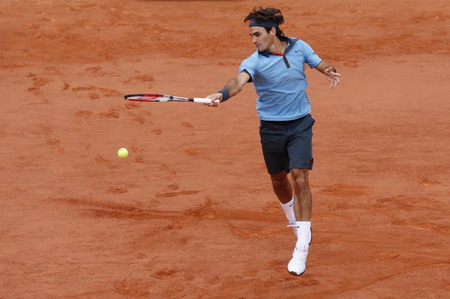 Grand Slam Federer storms to French Open glory