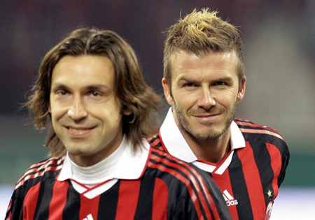 Team player Beckham widely praised on Milan return