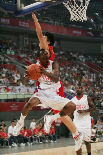 Yao charity game staged in Beijing