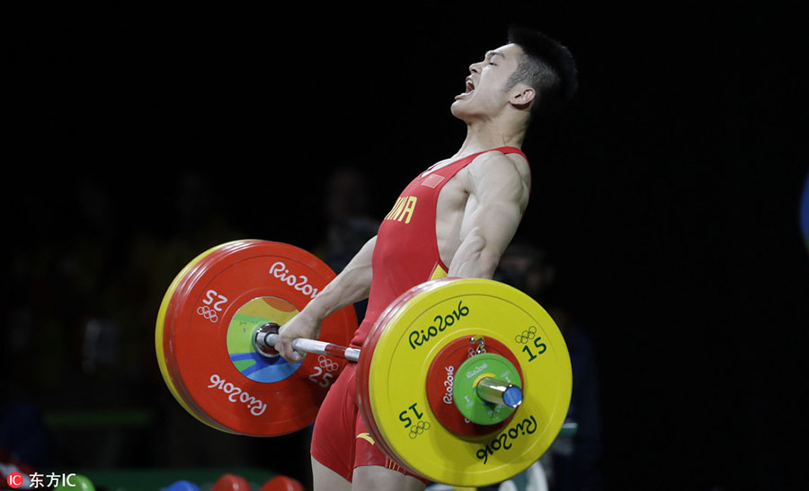 Chinese weightlifter Shi ZhiYong lifts gold