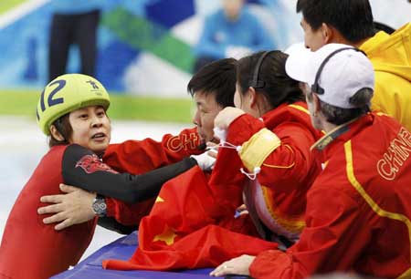 Wang Meng defends 500m short track gold