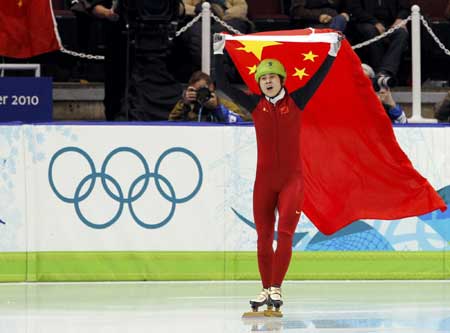 Wang Meng defends 500m short track gold