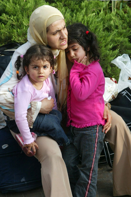 People flee Lebanon by the thousands