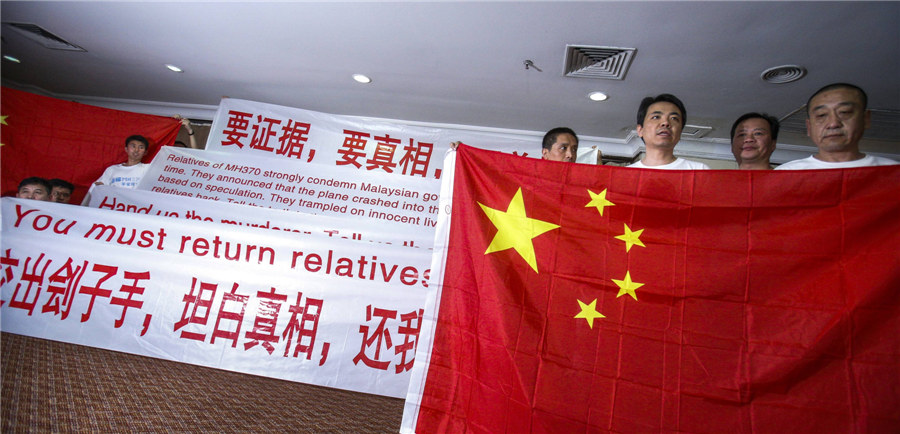 Chinese families demand 'evidence, truth' from Malaysia