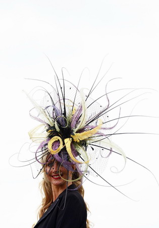 UK Royal Ascot: He on horse, she in hat