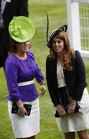 UK Royal Ascot: He on horse, she in hat