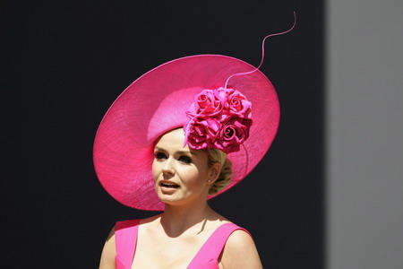 UK Royal Ascot: He on horse, she in hat