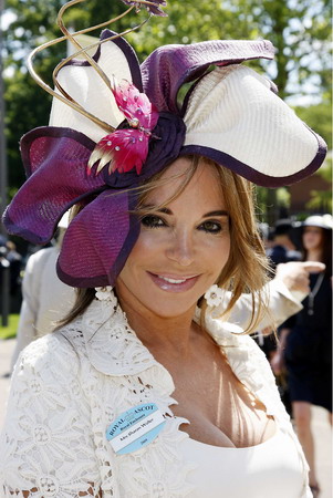 UK Royal Ascot: He on horse, she in hat