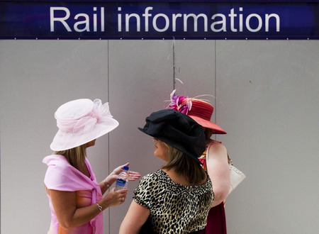 UK Royal Ascot: He on horse, she in hat