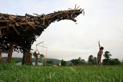Scrap-wood dinosaur posing modern-day problem
