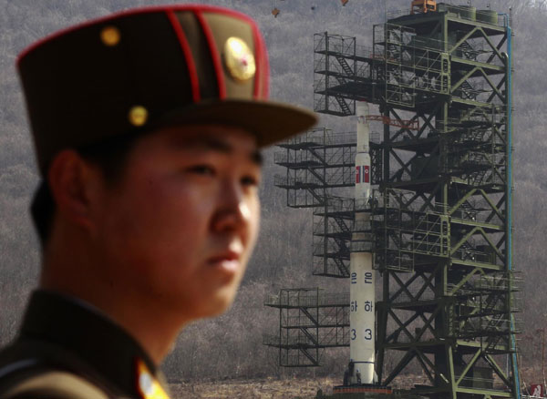 DPRK puts rocket on pad for satellite launch