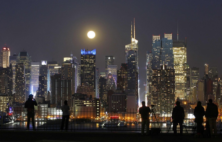 Full moon rises over New York City