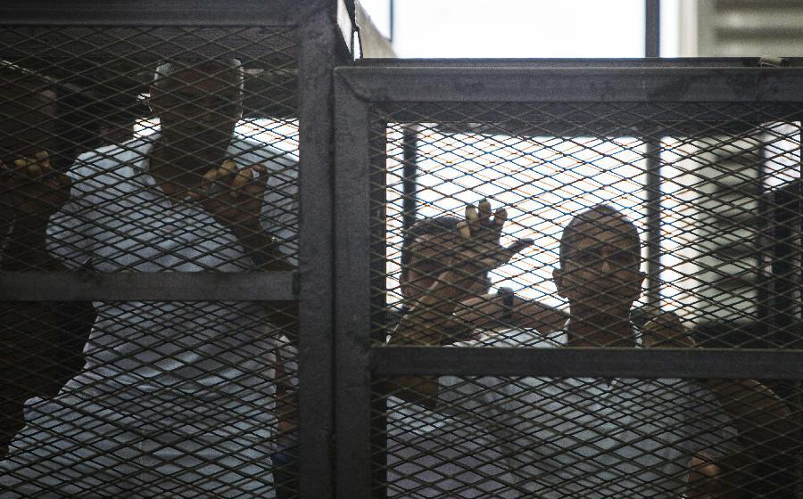 Egypt sentences three Jazeera journalists to 7 yrs