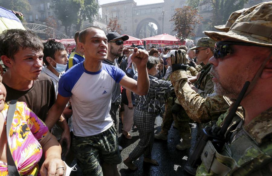 Smoke rises during clashes in Kiev