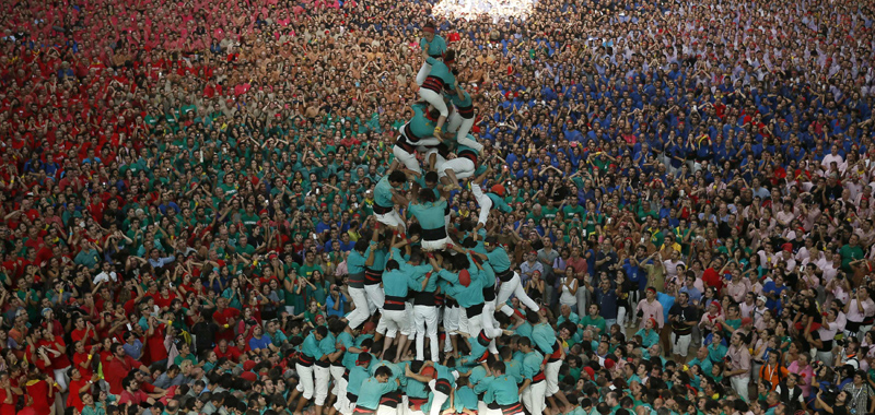 Castellers build human towers