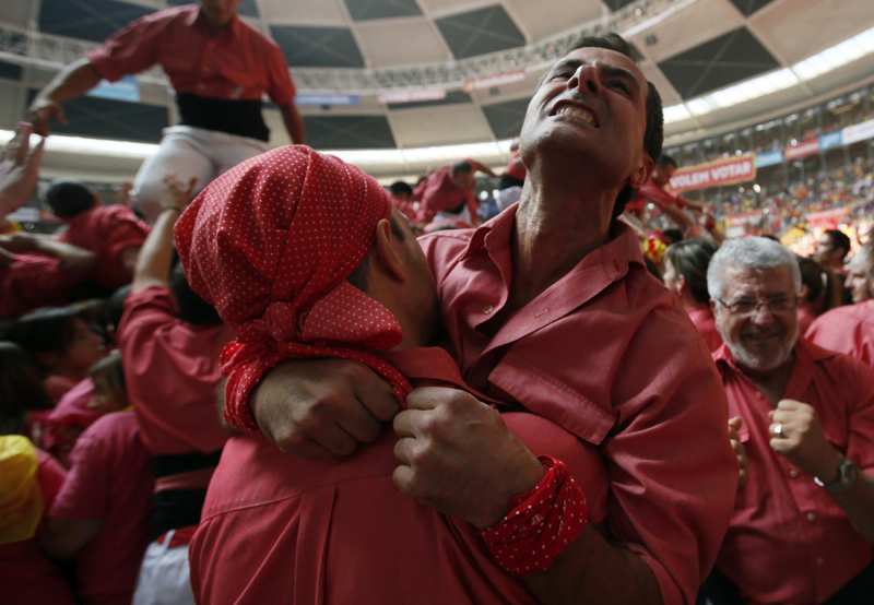 Castellers build human towers