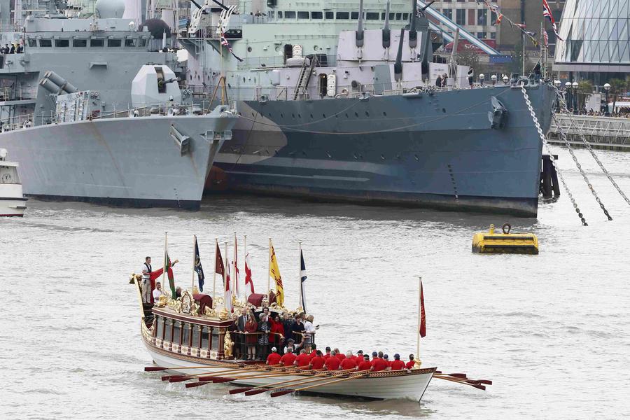 Flotilla sails down Thames to mark Queen's long reign