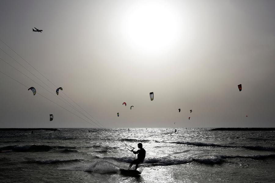 Go kitesurfing in Israel