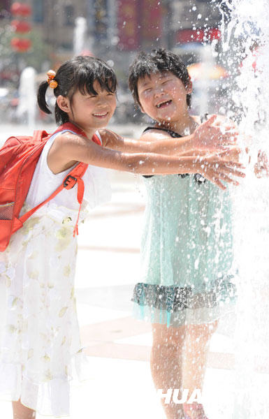 热浪席卷全国17省市 多地区高温超40℃(图)