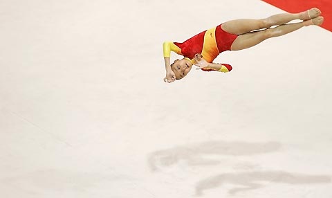 China's Pang Panpan competes on the floor during the women's team final at the 39th Artistic Gymnastics World Championships in Aarhus, Denmark, October 18, 2006. Team China won the gold followed by silver medallist team U.S. and Russia the bronze. 