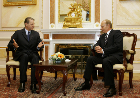 Putin meets IOC President Rogge