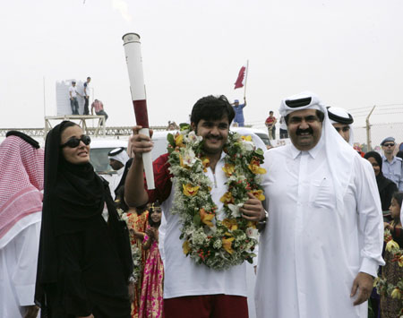 Asian Games torch backs in Qatar