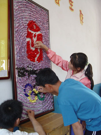 Deaf-mute students embrace Olympics with handwork cranes