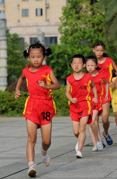 Children walk toward Olympic dreams