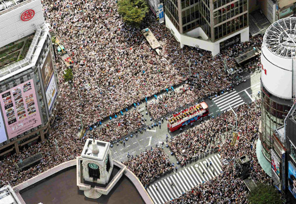 First Olympic parade brings Tokyo to standstill