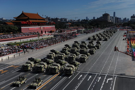 Weapons and equipment are displayed in parade