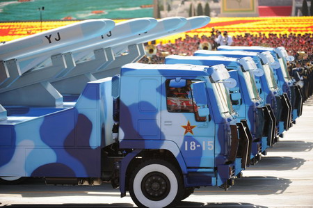 Weapons and equipment are displayed in parade