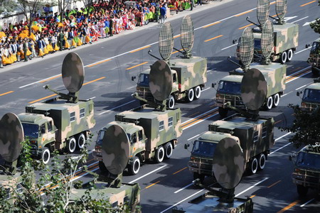 Weapons and equipment are displayed in parade