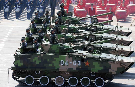 Weapons and equipment are displayed in parade