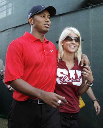 Woods taking break from golf, admits infidelity