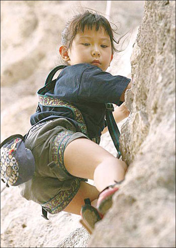 Sport of rock climbing elevates kids