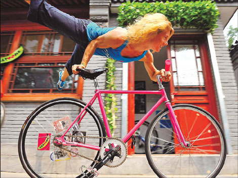 Freewheeling acrobat peddles love of bikes