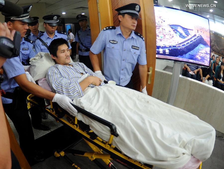 Beijing airport blast suspect stands trial