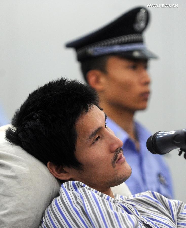 Beijing airport blast suspect stands trial