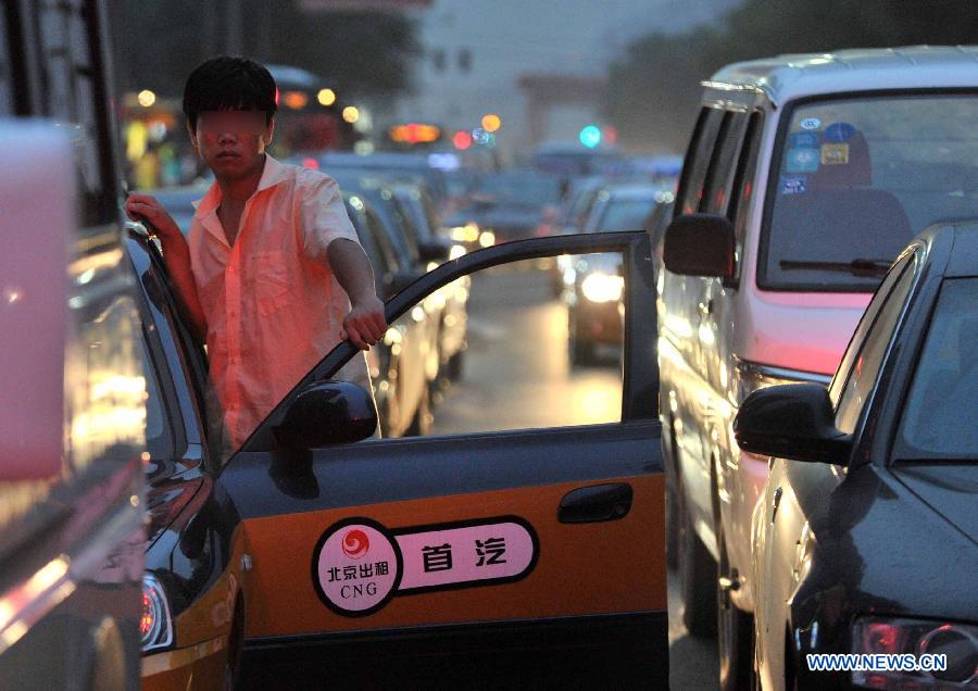 Beijing remains clogged with traffic jams on Car Free Day