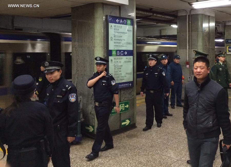 Beijing subway temporarily suspended after man jumps off platform