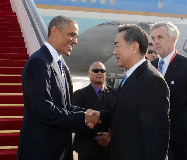 Obama arrives in Beijing for APEC meeting, state visit