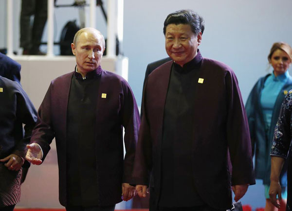 Tailor-made APEC leader suits sparks new fashion fever