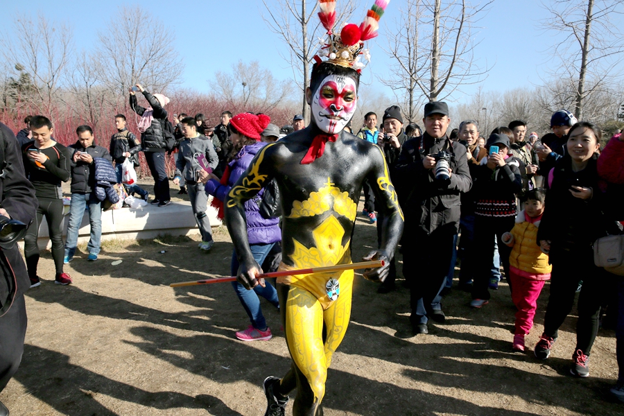 Monkey king, angel and superwoman at Beijing's Undie Run race