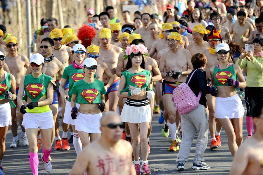 Monkey king, angel and superwoman at Beijing's Undie Run race