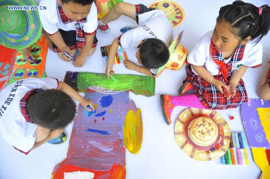 Painting event held to greet upcoming Int'l Children's Day in Beijing