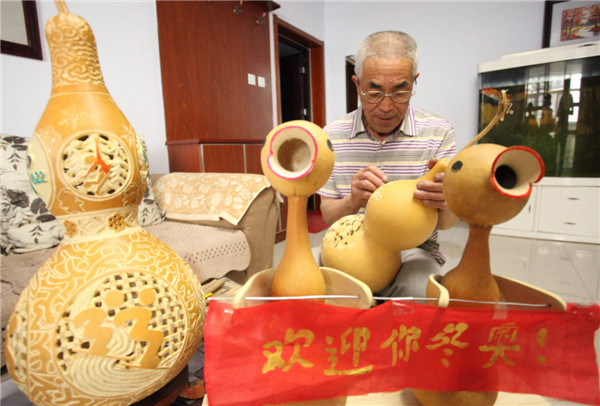 Gourd sculpture carves dream of Winter Games