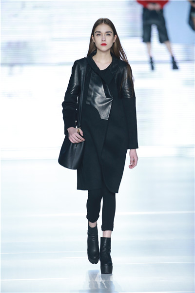 Models present creations during Fashion Beijing[22]