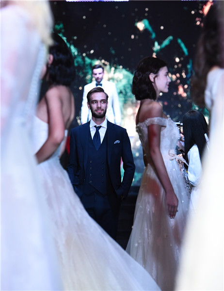 Models present creations at W Beijing's fashion wedding show