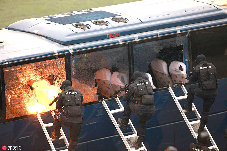 Aim, shoot, rescue: SWAT teams train in Beijing